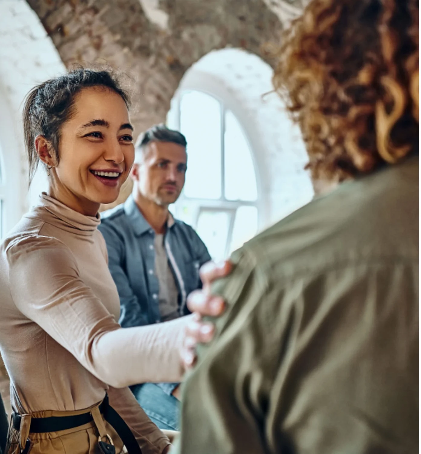 woman having with another man while in group therapy